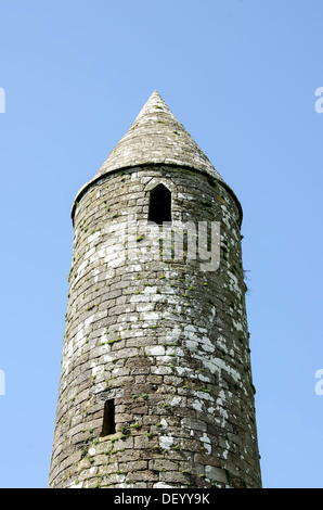 Pointed top of the 90-foot round tower circa 1100 at St. Patrick's Rock of Cashel Ireland County Tipperary Stock Photo