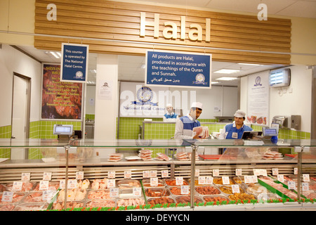 Halal food meat counter in Tesco supermarket, Fiveways, Birmingham UK - example of multicultural Britain concept Stock Photo