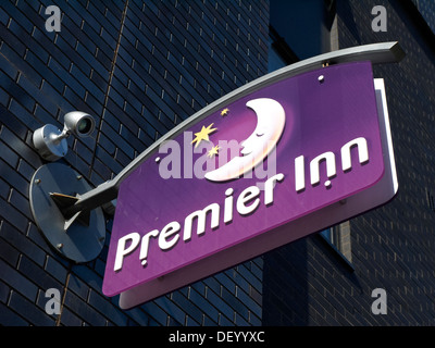 Premier Inn hotel sign on outside wall UK Stock Photo