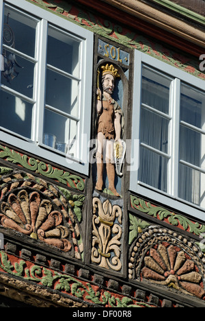 Wood carving with a king as a symbol of the sun, half-timbered house built in the Weser Renaissance style, Lemgo Stock Photo