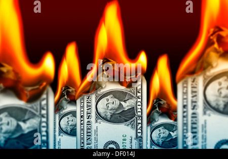 Burning one-dollar bills, state indebtedness of the USA, Brennende Ein-Dollar-Scheine, Staatsverschuldung der USA Stock Photo