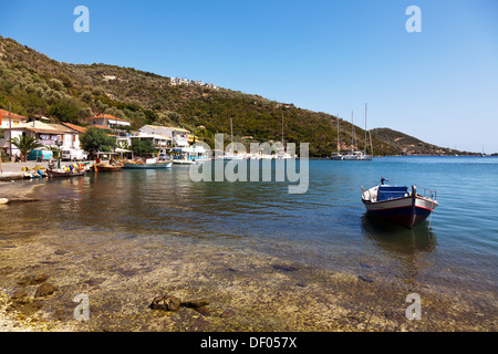 Small traditional wooden fishing boat in Sivota village Lefkada Lefkas Greek Island Greece harbour harbor Stock Photo