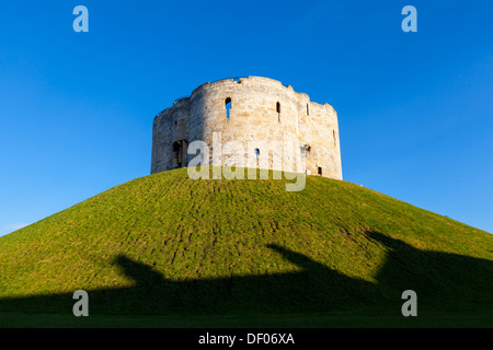 Clifford's Tower in York, England. The stone keep is all that remains of York Castle, the Medieval Norman Castle. Stock Photo