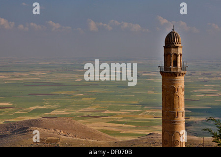 Mosque Minaret the town of Mardin from the hills above the valley floor looking towards Syria. Stock Photo