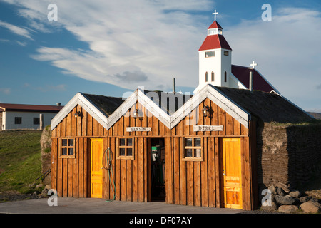 The church and a petrol station in a wooden hut, Moeðrudalur, Highlands of Iceland, Iceland, Europe Stock Photo