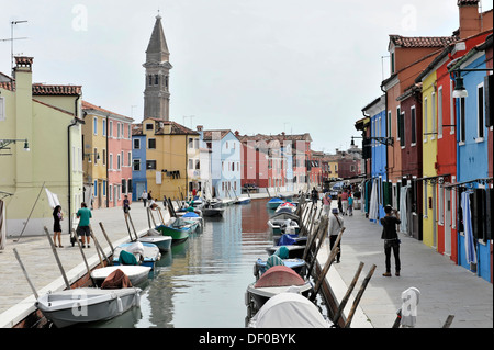 Colourful painted houses, boats on the canal of Burano, Burano Island in the lagoon of Venice, Italy, Europe Stock Photo