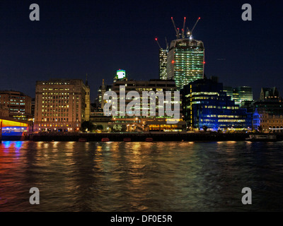 Night view of the River Thames and the City of London skyline showing the Walkie-Talkie skyscraper, England, United Kingdom Stock Photo