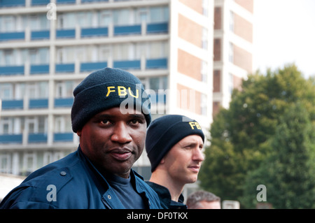 Firefighters strike from 12-4pm in a protest at threats to their pensions. Shoreditch fire station. Stock Photo