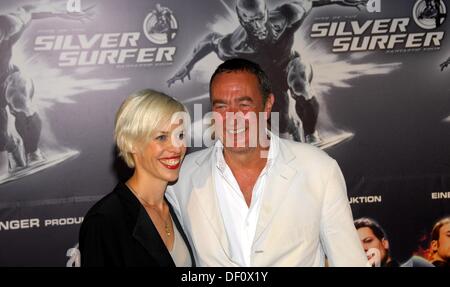 Bernd Eichinger and his wife Katja Eichinger at the film premiere of 'Rise of the Silver Surfer' in Berlin. Stock Photo