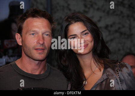 Thomas Kretschmann and girlfriend Shermine Shahrivar at the premiere of 'Phantomschmerz' in Berlin on the 20th of April in 2009. Stock Photo