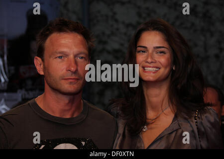 Thomas Kretschmann and girlfriend Shermine Shahrivar at the premiere of 'Phantomschmerz' in Berlin on the 20th of April in 2009. Stock Photo