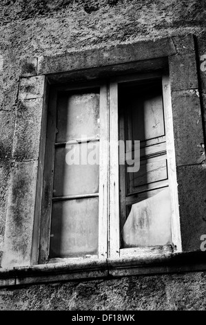 Scanno village, Italy. Window with broken glass Stock Photo