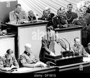 The image from the Nazi Propaganda! shows Reich Chancellor Adolf Hitler delivering a speech to the Reichstag in the Kroll Opera House in Berlin, Germany, 26 April 1942. During that session, a resolution of the Greater German Reichstag was passed that legitimized the Führerbefehl (Führer's Order) as the final decision making body without reference to formal principles of law. Fotoarchiv für Zeitgeschichte Stock Photo