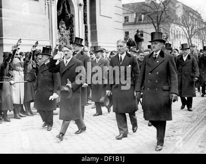Reich Chancellor Adolf Hitler is pictured with Vice Chancellor Franz von Papen and representatives of the Reich government upon their arrival at the celebrations of the ceremonial opening of the Reichstag, in front of the Garrison Church in Potsdam, Germany, 21 March 1933. Fotoarchiv für Zeitgeschichte Stock Photo