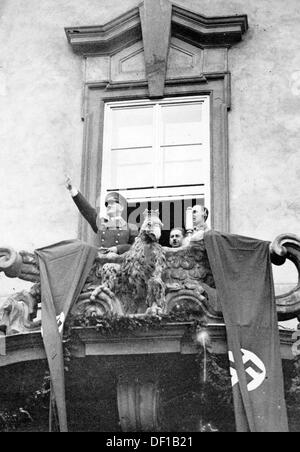 The image from the Nazi Propaganda! shows Adolf HItler on the balcony of the city hall of Brünn, Czech Republic, on 18 March 1939. Three days earlier, the protectorate Bohemia and Moravia were established after the invaions of German troops into the territories that had been independent before. Fotoarchiv für Zeitgeschichte Stock Photo