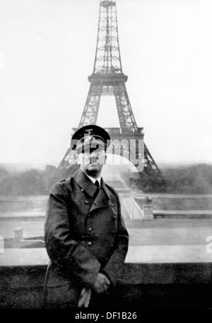 The image from the Nazi Propaganda! shows Adolf Hitler in front of the Eiffel Tower in Paris, France, which was occupied by German troops, on 28 June 1940. Fotoarchiv für Zeitgeschichte Stock Photo