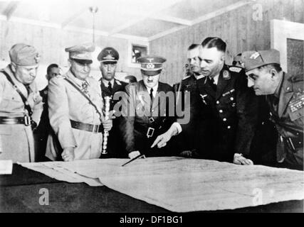 The image from the Nazi Propaganda! shows Adolf Hitler reviewing the military situation in  the command bunker of Göring in Potsdam, Germany, date unknown. (3-r Major General Josef 'Beppo' Schmid) Fotoarchiv für Zeitgeschichte Stock Photo
