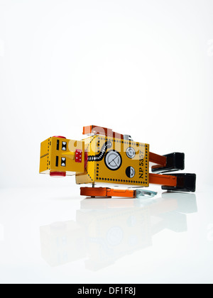 Vintage toy robot on a white background Stock Photo