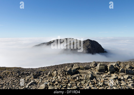 Sca Fell Surrounded by a Sea of Cloud Created by a Temperature Inversion Viewed from the Summit of Scafell Pike Lake District UK Stock Photo
