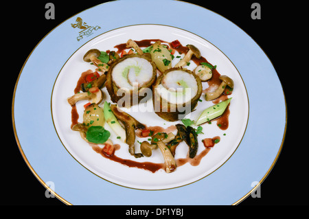 Paupiette Of Black Sea Bass Rolled In A Crispy Potato With Braised Leeks And Barolo Wine Sauce The Ritz Restaurant London Stock Photo Alamy