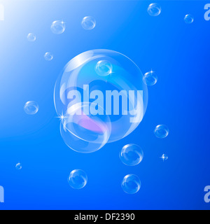 Transparent soap bubbles on blue background Stock Photo