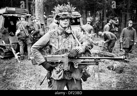 Swedish conscript carrying a KSP-58 machine gun during maneuvers (1988 ...