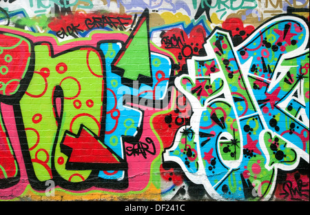 colourful graffiti on urban city wall, norfolk, england Stock Photo