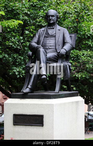 Statue of George Peabody outside Peabody Institute, East Mount Vernon Place, Baltimore, Maryland, USA Stock Photo