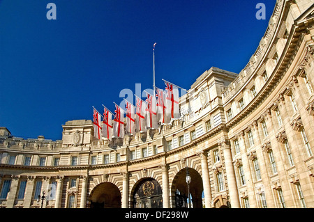 White ensign flags flying from Admiralty Arch, The Mall, London.