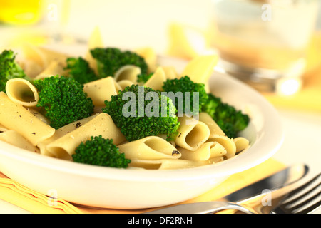 Broccoli with pasta (Selective Focus, Focus on the broccoli in the middle of the image) Stock Photo