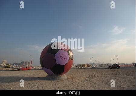 (dpai-file) A file picture dated 06 January 2011 shows an oversize football standing on a roundabout in Doha, Qatar. From 07 to 28 January 2011, the Asia Cup, Asian Soccer Championship, takes place in Doha. Qatar is host of the Fifa Soccer Championship in 2022. Photo: Andreas Gebert/dpa Stock Photo