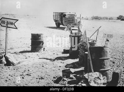 The image from the Nazi Propaganda! depicts road signs in the desert of Africa, published on 24 June 1942. Place unknown. Fotoarchiv für Zeitgeschichte Stock Photo