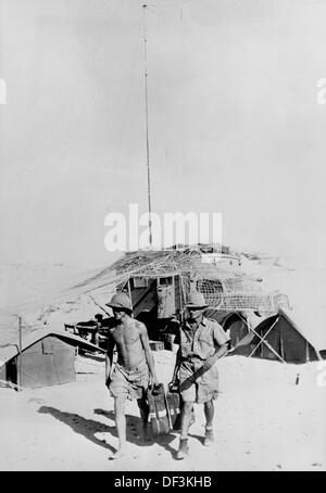 The image from the Nazi Propaganda! shows soldiers of the German Africa Corps next to a telephone station in Africa, published 7 December 1941. Place unknown. Fotoarchiv für Zeitgeschichte Stock Photo