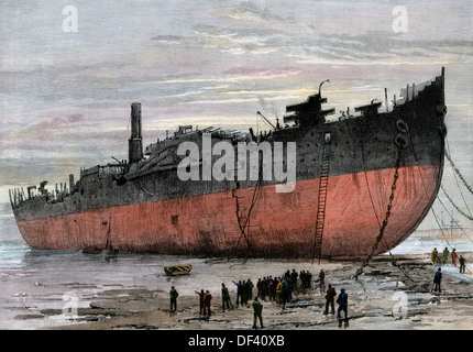 Wrecked hull of the steamship 'Great Eastern' at New Ferry, England, 1889. Hand-colored woodcut Stock Photo