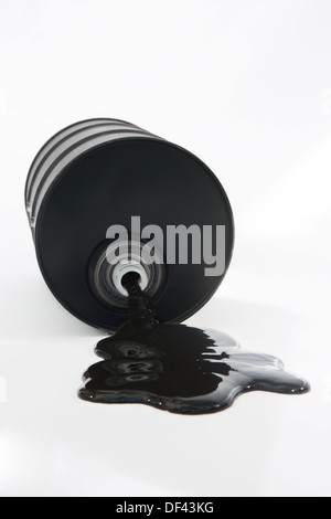 Oil Spilling From Barrel On White Background Stock Photo