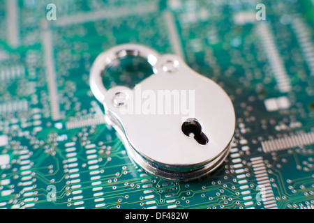 Closed Padlock On Circuit Board Stock Photo