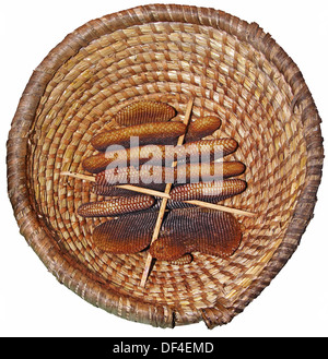 Straw bee hive and honeycomb isolated on white background Stock Photo