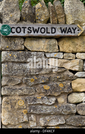 Cotswold Way Wooden Sign on Stone wall Stock Photo