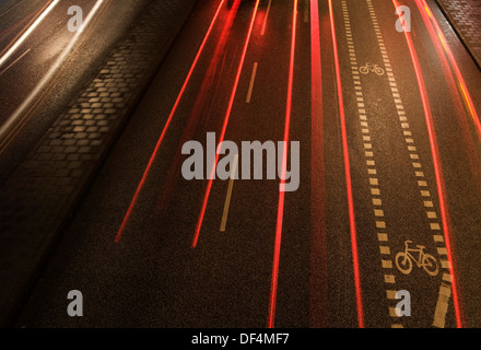Streaking Red Car Lights on Road at Night, High Angle View Stock Photo
