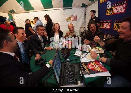 LA, CA, USA. 26th Sept, 2013. (L-R) Los Angeles Councilman Joe Buscaino, late night talk show host Jimmy Kimmel (Jimmy Kimmel Live!), Los Angeles Mayor Eric Garcetti and his wife, social activist Amy Wakeland, former Los Angeles Counclman Dennis Zine and actor Joe Mantegna (Criminal Minds) talk about the Feast of San Gennaro Italian Festival with talk radio host Peter Tilden live on the Peter Tilden Show on KABC radio at the Prima Notte Gala in Los Angeles, CA, USA on September 26, 2013. © Kayte Deioma/Alamy Live News Stock Photo