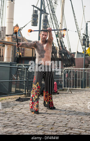 Wapping, London, UK. 27th Sept, 2013. Entertainer at London Tattoo Convention, Tobacco Dock, Wapping, London, England, 27 September 2013 © Terence Mendoza/Alamy Live News Stock Photo