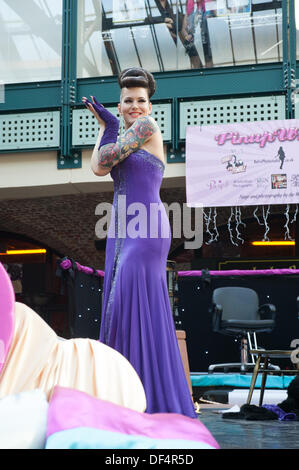 International burlesque performer Beatrix Von Bourbon entertains on the pin-up stage at the London Tattoo Convention 2013 Stock Photo