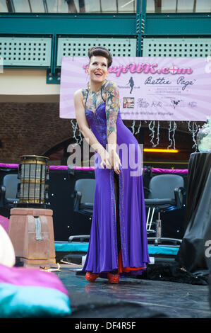 International burlesque performer Beatrix Von Bourbon entertains on the pin-up stage at the London Tattoo Convention 2013 Stock Photo