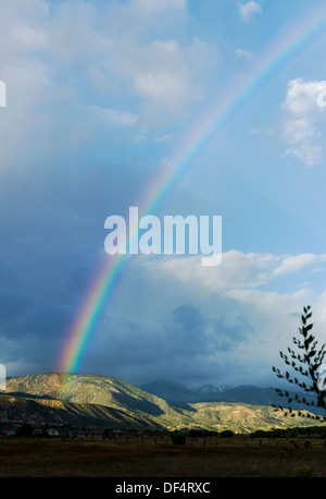 Rainbow over the Rocky Mountains, just outside Salida, Colorado, USA Stock Photo