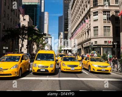 Yellow Taxis Stopped at Traffic Light, NYC, USA Stock Photo