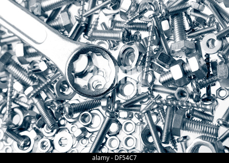 Steel wrench on nuts and bolts Stock Photo
