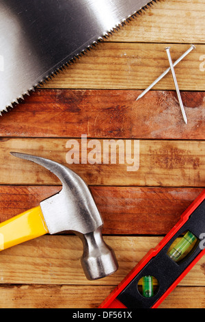 Assorted work tools on wood Stock Photo