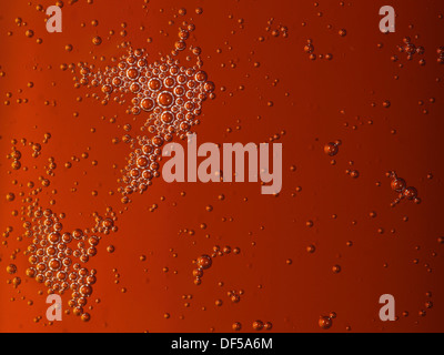 closeup - orange motor oil with bubbles texture background Stock Photo