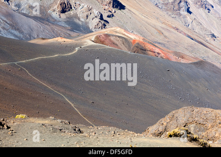 A cinder cone and trails inside the large Haleakala crater in Maui, Hawaii. Stock Photo
