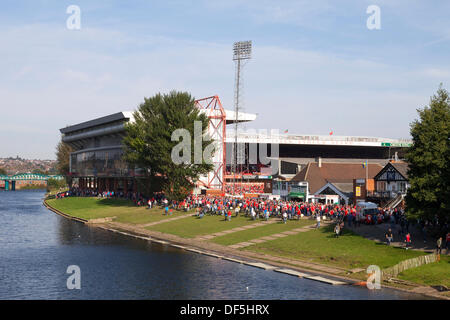 The City Ground, Nottingham, U.K. 28th September 2013. Fans leave the City Ground after Nottingham Forest beat Derby County 1-0 in the East Midlands derby. Victory for Nottingham Forest came after a Jack Hobbs header in the 41st minute gave Forest the lead. 28,276 supporters watched the game in warm autumn sunshine. Credit:  Mark Richardson/Alamy Live News Stock Photo